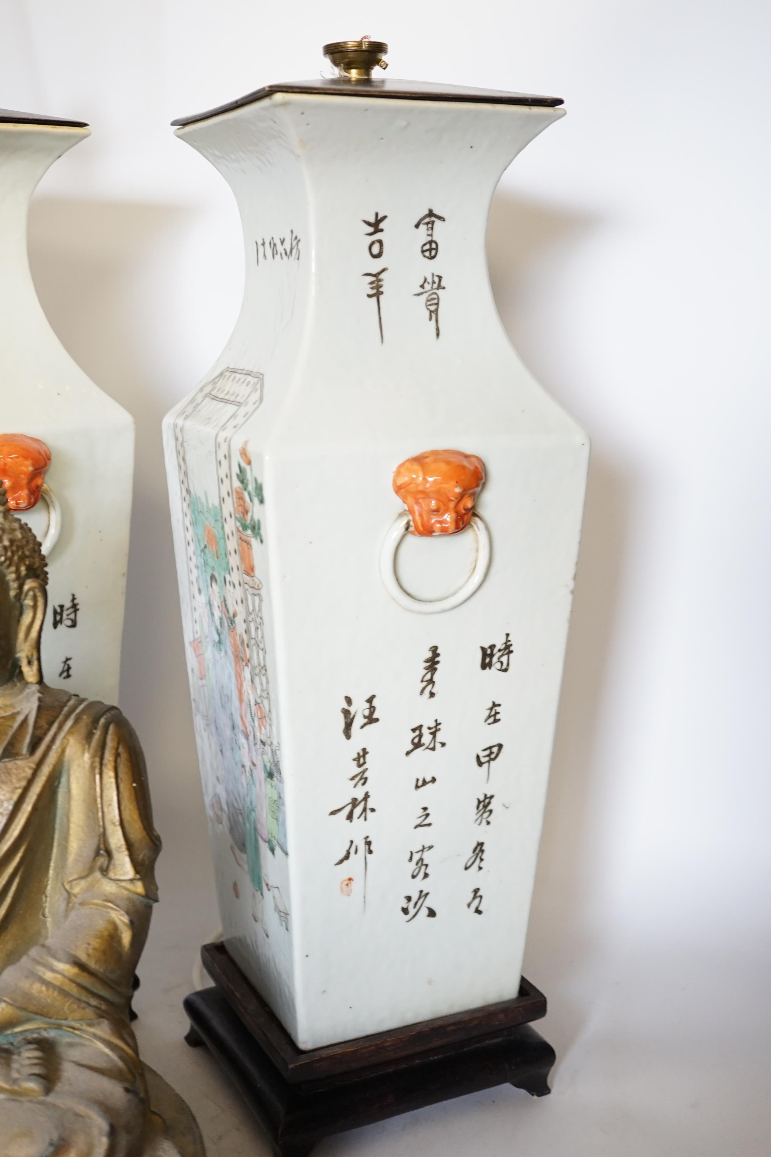 A pair of early 20th century Chinese famille rose vases, mounted as lamps and a plaster model of a Buddha, vases 46cm